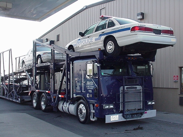 How to load car on carrier